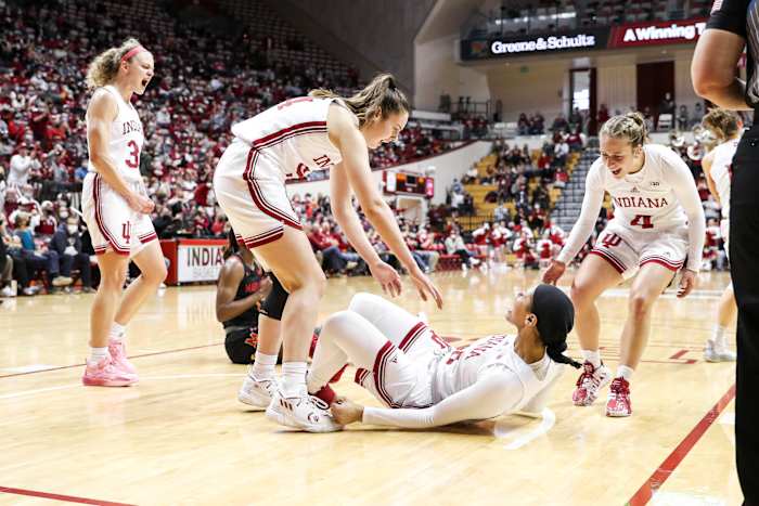 Mackenzie Holmes helps up forward Kiandra Browne.